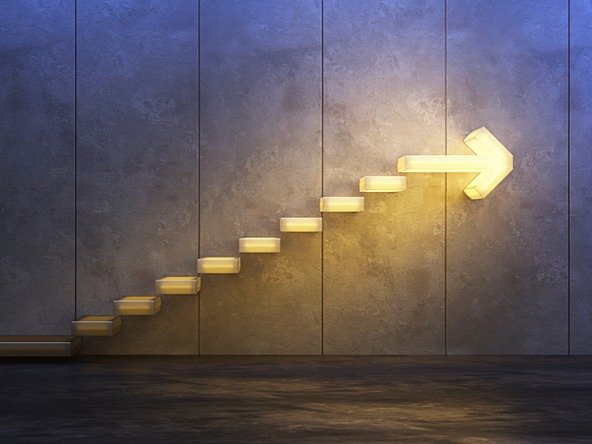 yellow glowing stairs with arrow at the top